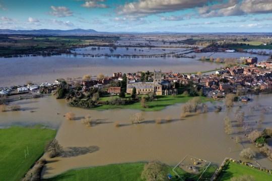 Tewkesbury Abbey, at the confluence of the Rivers Severn and Avon, is surrounded by flood waters on February 27, 2020 in Tewkesbury, England (Picture: Getty Images)